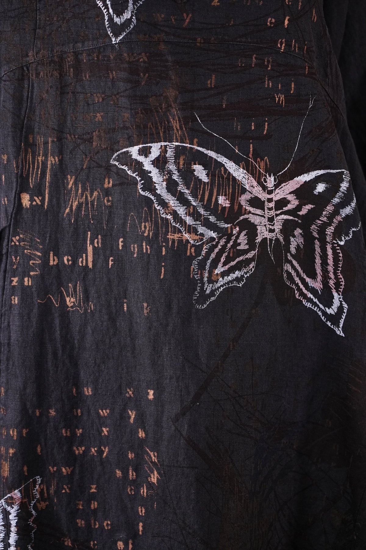 2133 Crossover Linen Tunic Black Sand Butterfly Alphabet
