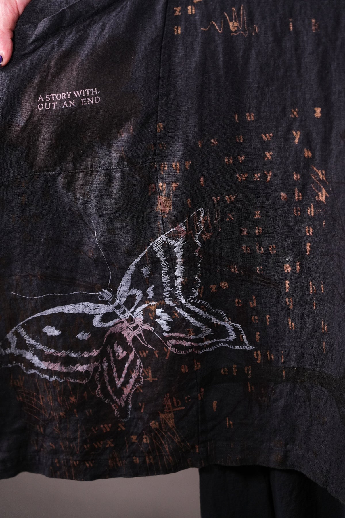 2133 Crossover Linen Tunic Black Sand Butterfly Alphabet